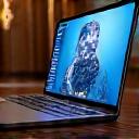 Laptop with video call window, luxurious setting